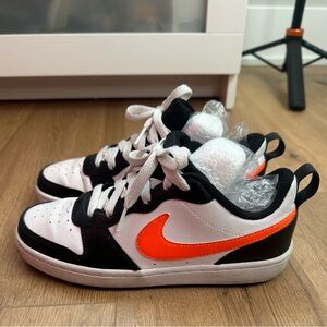 Nike Dunk Low Retro
Orange Swoosh Panda